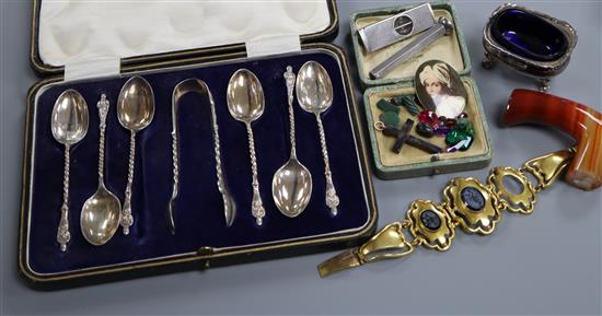 A cased set of silver teaspoons & tongs, a silver salt and cigar cutter, pinchbeck bracelet, loose gemstones etc.